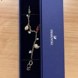 NEW Swarovski Ocean Charm Bracelet Gold Tone Crystal Shell Coral Pearl Dangle